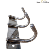 7-piece stainless steel bathroom accessory set by Eman & Brothers with cup holder, towel rod, hooks, and more